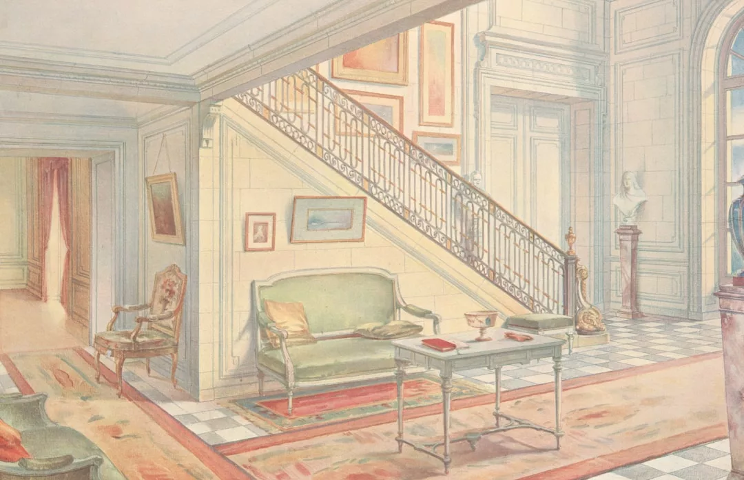 Sunlit, elegant foyer with a luxury checkered floor, antique furniture, framed art, and a staircase; a bust sits on a pedestal near tall windows.