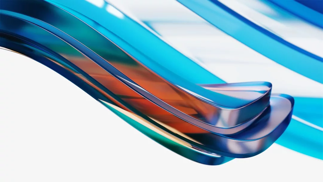 Curved, semi-transparent blue and orange glass-like ribbons overlap on a white background, creating an abstract, flowing design inspired by Glamesia’s sense of luxury and modern fashion.