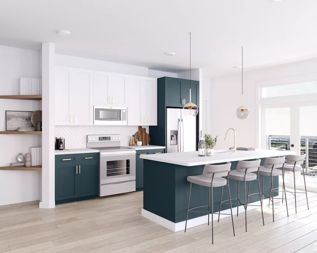 Modern kitchen with white upper cabinets, dark blue lower cabinets and island, stainless steel appliances, wooden shelves, pendant lights, and four gray bar stools at the island—perfect for those who appreciate a touch of Glamesia luxury.