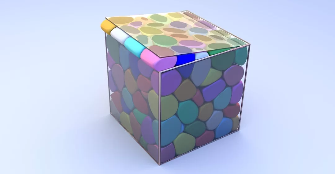 A transparent glass cube filled with colorful, rounded, pebble-like shapes evokes a sense of modern lifestyle and refined fashion, set against a light blue background.